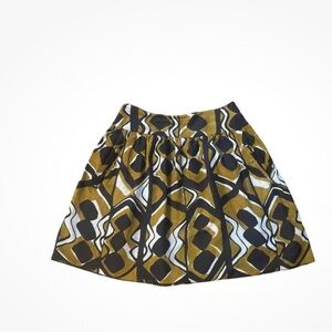 Anna Sui Anthropologie women’s black and gold skirt. Size 8